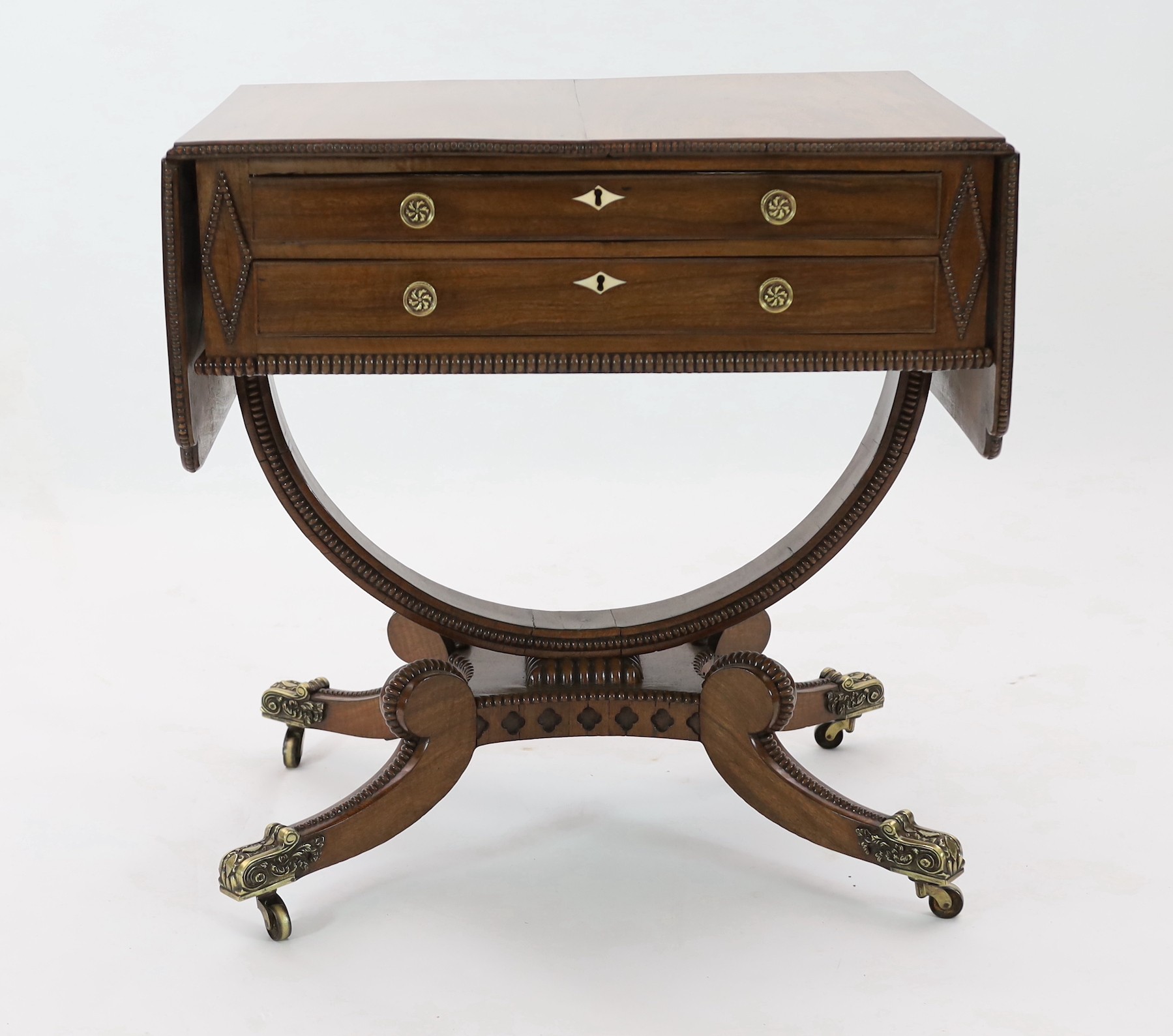 A Regency mahogany drop leaf work table, width extended 122cm, depth 50cm, height 71cm